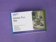 a box of green tea sitting on top of a table